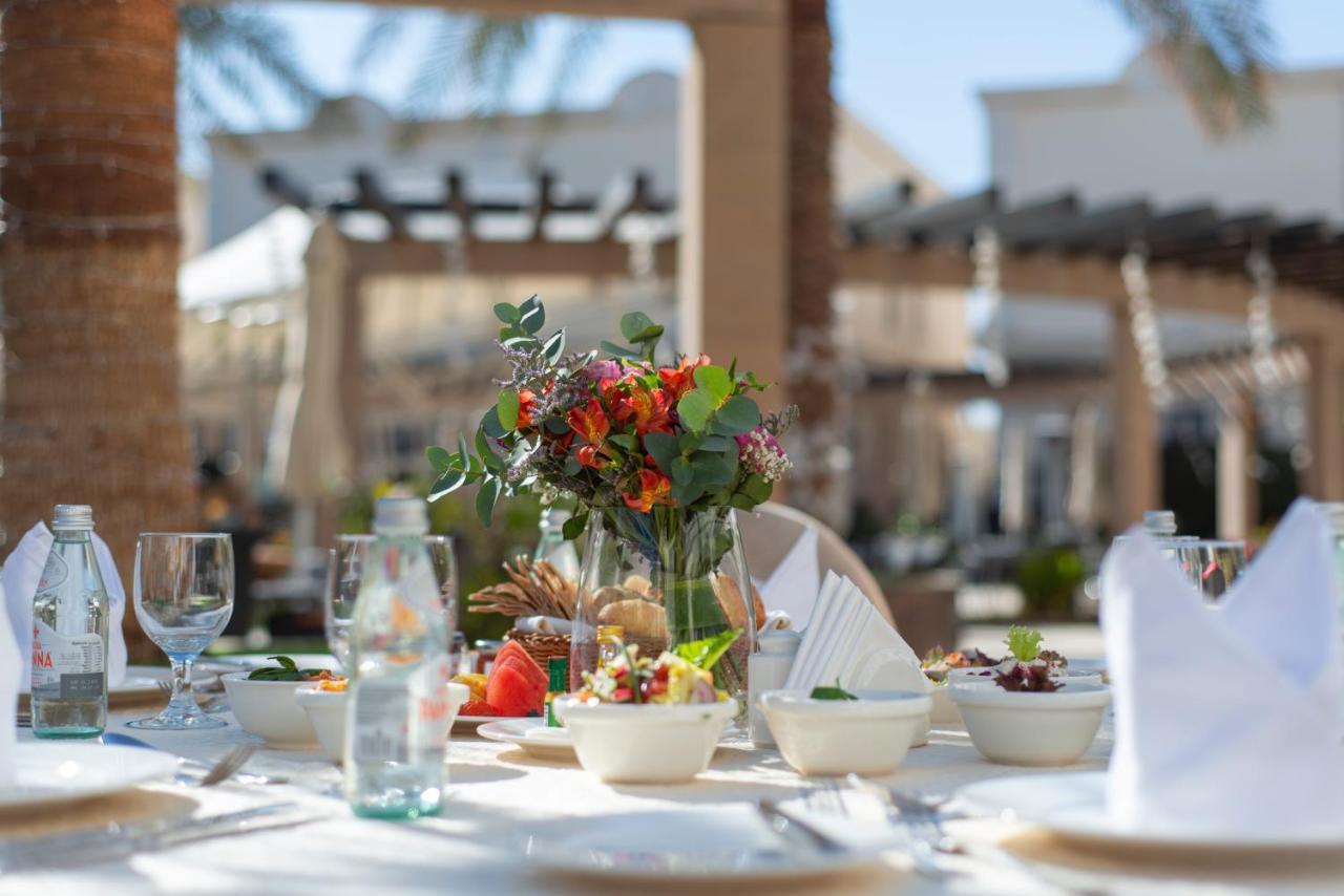 Vittori Palace Hotel And Residences Riyad Dış mekan fotoğraf A table set for a meal