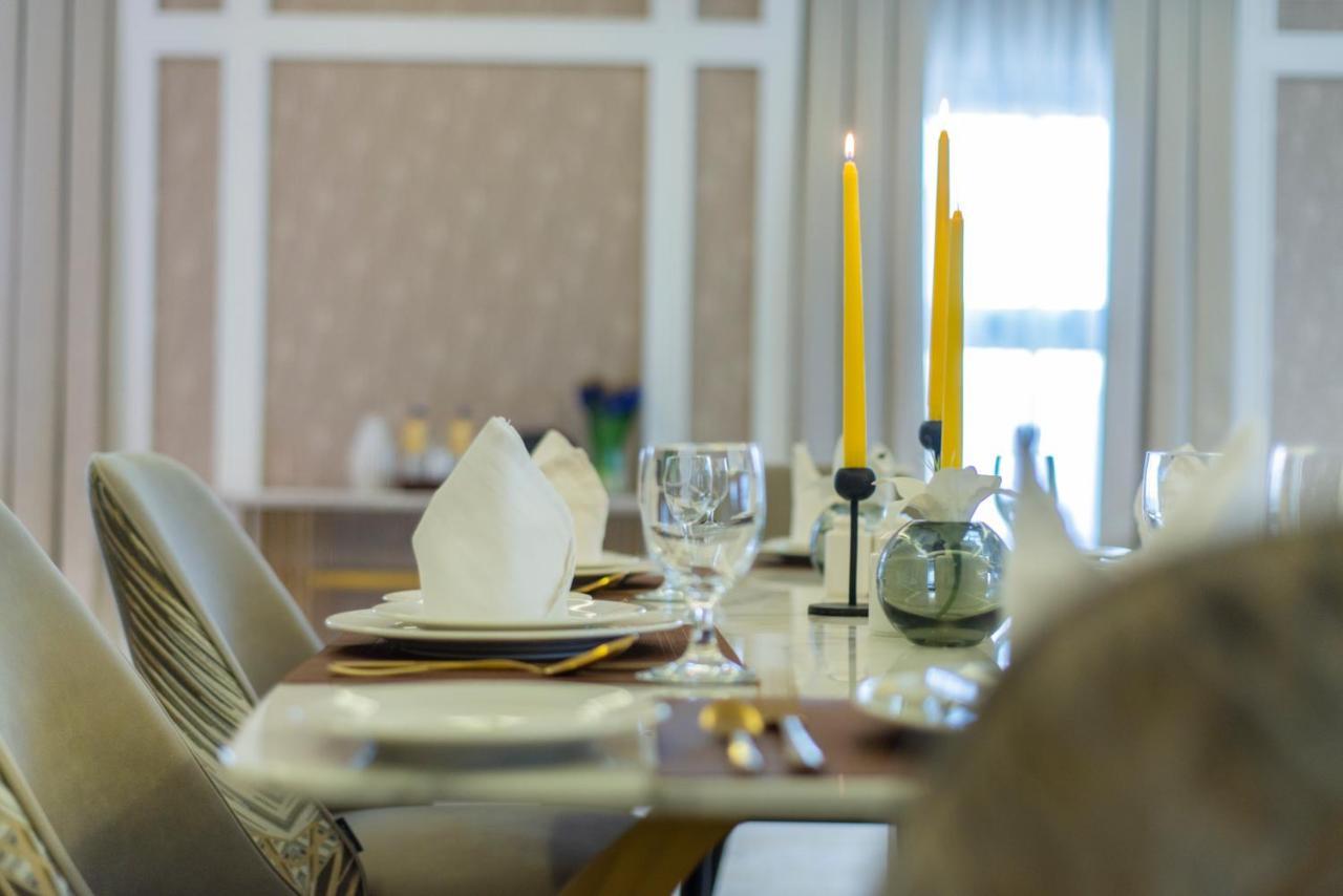 Vittori Palace Hotel And Residences Riyad Dış mekan fotoğraf A table set for a meal
